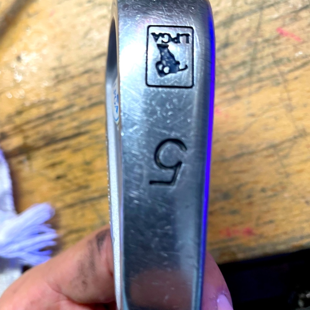 Woman’s golf club iron 5
LPGA